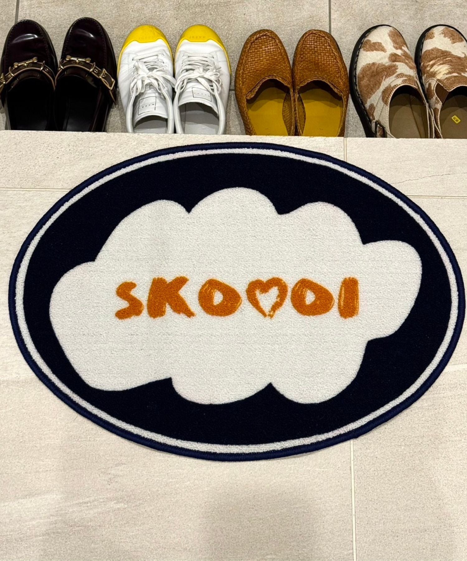 skoool logo rug